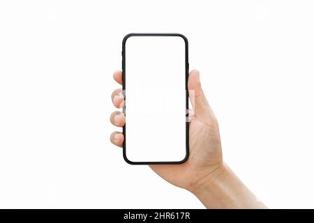 Männliche Hand hält Smartphone mit leerem Bildschirm isoliert auf weißem Hintergrund. Stockfoto