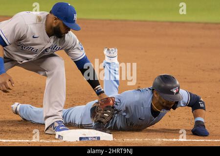 Kansas City Royals' Carlos Santana celebrates hitting an RBI double during  the fifth inning of a baseball game against the Texas Rangers, Friday, June  25, 2021, in Arlington, Texas. (AP Photo/Brandon Wade