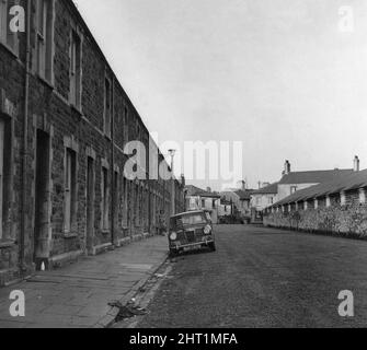 Cycle Street in Adamsdown, einem innerstädtischen Gebiet und einer Gemeinde im Süden von Cardiff, Wales. 14.. Januar 1965. Stockfoto