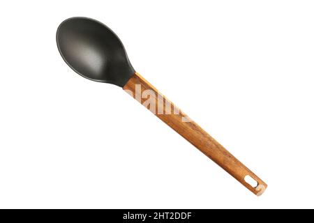 Küchenlöffel aus Kunststoff mit Holzgriff isoliert auf weiß Stockfoto
