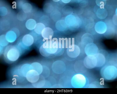 Blauer, glänzender Bokeh-Hintergrund Stockfoto