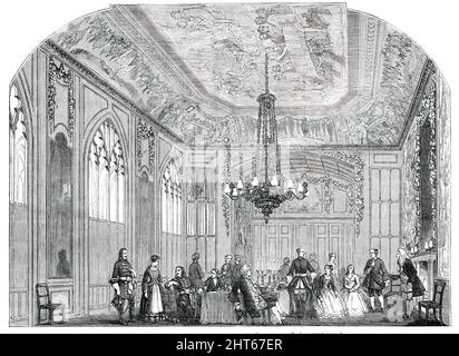 Theateraufführungen im Schloss Windsor - The "Green Room", 1850. Unterhaltung für Königin Victoria und Familie in der königlichen Residenz, Szene mit Schauspielern, die für „Karl den XII.“ gekleidet waren, und anderen, die sich am ersten Stück beteiligt hatten, ihre Kostüme für ihre üblichen Kleider überzogen haben. "Karl der XII." ging die "Tochter König Rene" voraus, übersetzt von Hon. Edmund Phipps, aus der deutschen Version des dänischen Gedichts von Henric Herz...der Staatliche Ante-Raum...fällt auf, als er den Stil zeigt, in dem viele der alten Staatssäle ihre Decken d hatten Stockfoto