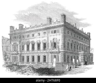 Bridgewater House - Architekt, Charles Barry, RA, 1850. Das Cleveland House in London wurde im Palazzo-Stil von Sir Charles Barry neu gestaltet. Der Wiederaufbau wurde abgeschlossen und 1854 in Lord Ellesmere umbenannt, Erbe des Herzogs von Bridgewater aus dem Jahr 3.. Es ist in Bath Stone gebaut. Die Fenster in den beiden Fronten, im Hauptgeschoss, haben gewölbte Giebel zu ihnen, gefüllt mit kleinen Schilden, die ein Monogramm von zwei "E." verflochten haben, für "Ellesmere"...die Eingangshalle...ist von schönem Design, mit gruppierten Säulen in den Winkeln. Über der Entablatur ist das ins Stockfoto