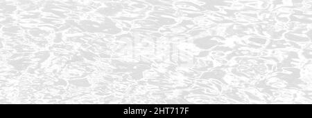 Nahaufnahme der entsättigte transparente klare ruhige Wasseroberfläche Textur mit Spritzern und Blasen. Trendy abstrakt Natur Hintergrund. Stockfoto
