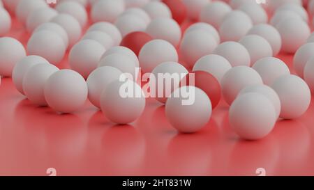 Viele bunte Plastikkugeln auf einer reflektierenden Oberfläche. Stockfoto