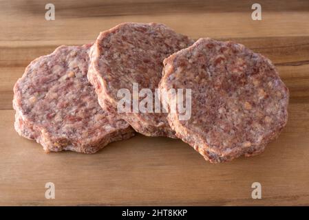 Beef-, Bacon- und Cheddar-Patties Stockfoto