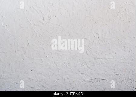 Weißer Beton- oder Zementhintergrund. Verputzte Wand Stockfoto