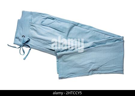 Isolierte Jogginghosen. Nahaufnahme von Frauen modische blaue Freizeithosen oder Jersey-Hosen isoliert auf weißem Hintergrund. Jogging-Outfit für Workou Stockfoto