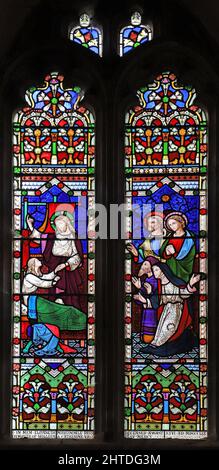 Ein Buntglasfenster, das die Auferweckung von Jairus's Tochter, St. John the Baptist Church, Mathon, Herefordshire, darstellt Stockfoto