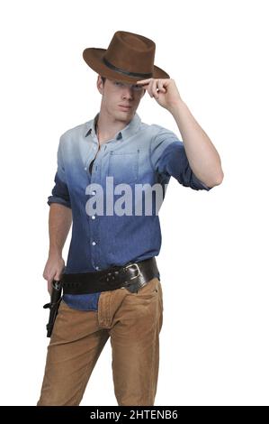 Hübscher Cowboy mit sechs Schützen Stockfoto