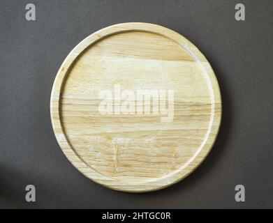 Draufsicht auf eine leere Holzplatte Stockfoto