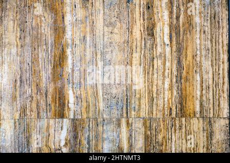 Hintergrund von einer Wand aus braunen Marmorplatten Stockfoto