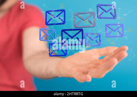 3D Rendern von E-Mail-Postfächern, die über einer Hand schweben, im grafischen Konzept der elektronischen Kommunikation Stockfoto