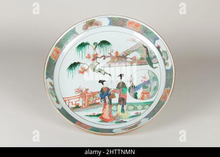 Kunst inspiriert von Plate (eins von einem Paar), Qing-Dynastie (1644–1911), Kangxi-Periode (1662–1722), China, Porzellan verziert mit Famille-Verte-Emaillen, Durchm. 15 Zoll (38,1 cm), Keramik, Klassisches von Artotop modernisiertes Werk mit einem Schuss Moderne. Formen, Farbe und Wert, auffällige visuelle Wirkung auf Kunst. Emotionen durch Freiheit von Kunstwerken auf zeitgemäße Weise. Eine zeitlose Botschaft, die eine wild kreative neue Richtung verfolgt. Künstler, die sich dem digitalen Medium zuwenden und die Artotop NFT erschaffen Stockfoto