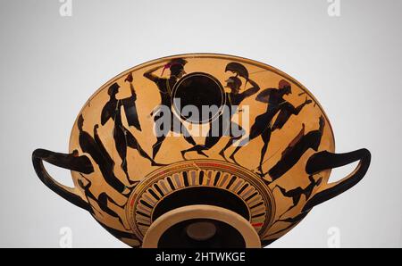 Terrakotta Kylix (Trinkbecher), Archaische, Ca. 550 v. Chr., Griechischer, Dachboden, Terracotta, schwarz Abbildung, Andere: 4 13/16 x 10 in. (12,2 x 25,4 cm), Vasen, Außen, Vorderseite und Rückseite, Kampf zwischen den Zuschauern. Im Vergleich mit der Kleine Meister Cups - die Lippe Tassen und Bechern - Band, die sich in Athen während der Mitte des sechsten Jahrhunderts v. Chr. vorherrschte. Stockfoto