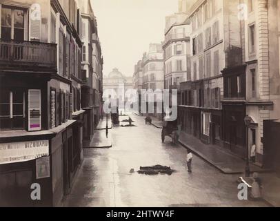 Kunst inspiriert von der Rue de Constantine, ca. 1865, Albumin-Silberdruck aus Glasnegativ, 27,3 x 36,8 cm (10 3/4 x 14 1/2 in.), Fotografien, Charles Marville (Französisch, Paris 1813–1879 Paris), zum Maler und Illustrator ausgebildet, begann Marville 1851 zu fotografieren, Und 1862 wurde er, Classic Works, von Artotop mit einem Schuss Moderne modernisiert. Formen, Farbe und Wert, auffällige visuelle Wirkung auf Kunst. Emotionen durch Freiheit von Kunstwerken auf zeitgemäße Weise. Eine zeitlose Botschaft, die eine wild kreative neue Richtung verfolgt. Künstler, die sich dem digitalen Medium zuwenden und die Artotop NFT erschaffen Stockfoto