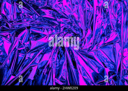 Neon Hintergrundfolie mit violettem und blauem Licht. Psychedelisch abstrakte Verlaufsstruktur. Verrückte Tapete. Stockfoto
