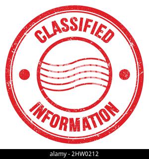 CLASSIFIED INFORMATION text written on red round postal stamp sign Stockfoto