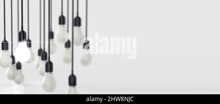 Glühende 3D-Glühlampe zwischen den anderen auf grauem Hintergrund. Führung, Innovation, große Idee und individuelle Konzepte. 3D Rendern. Stockfoto