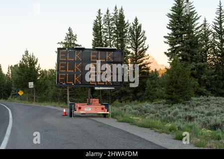 Schild Warnung Fahrer von Elch auf der Straße im Grand Teton National Park Stockfoto