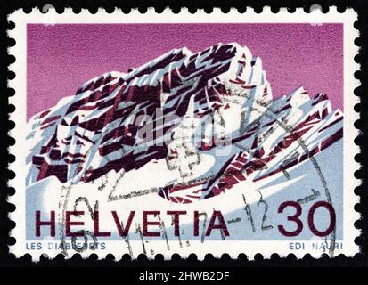 SCHWEIZ - UM 1971: Eine in der Schweiz gedruckte Briefmarke zeigt Les Diablerets, Waadt, um 1971. Stockfoto