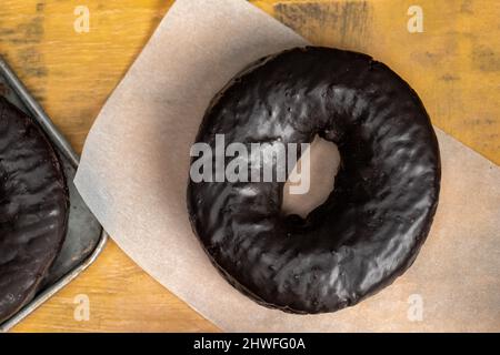 Schokolade Spenden auf Wachspapier Schuss von oben - flach legen Stockfoto