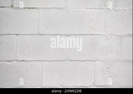 Hochauflösende Textur einer weiß lackierten Betonsteinwand Stockfoto