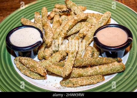 Port Charlotte Florida, Applebee's, Restaurant Essen Essen Essen, innen Teller Gericht gebratene grüne Bohnen Sauce Stockfoto