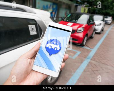 Smartphone und Sharing Car Stockfoto