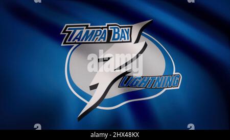 Winkende Flagge mit dem Logo der NHL-Eishockeymannschaft Tampa Bay Lightning. Nahaufnahme der winkenden Flagge mit dem Logo der NHL-Hockeymannschaft von Tampa Bay Lightning und nahtloser Schleife. Eito Stockfoto