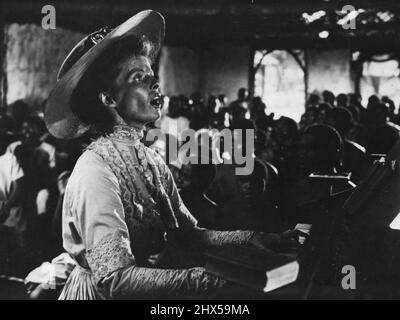 Katharine Hepburn spielt eine jungfräuliche Missionarin in einem afrikanischen Dorf, dessen Gelassenheit von den Auswirkungen des Ersten Weltkriegs und Humphrey Bogart überwältigt wird. 29. Oktober 1951. Stockfoto