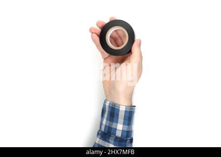 Männliche Hand hält Isolierband, isoliert auf weißem Hintergrund Stockfoto