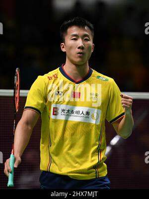 Mülheim, Deutschland. 10. März 2022. Lu Guangzu aus China feiert beim Badmintonturnier Yonex German Open 2022 in Mülheim, Deutschland, 10. März 2022 den Torreigen beim zweiten Männerspiel zwischen Lu Guangzu aus China und Srikanth Kidambi aus Indien. Quelle: Lu Yang/Xinhua/Alamy Live News Stockfoto