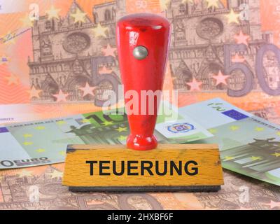 Symbolbild zum Thema Inflation mit einem Stempel Stockfoto