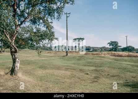 Rough Castle Fort Remains - eine römische Festung an der Antonine Wall etwa 2 Kilometer südöstlich von Bonnybridge in der Nähe von Tamfourhill in der Falkirk council Area, Schottland. Archivscan von einem Dia. September 1972. Stockfoto