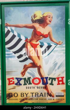 England, Dorset, Isle of Purbeck, Corfe Castle, der historische Bahnhof, Vintage Railway Poster Advertising Service to Exmouth in South Devon Stockfoto