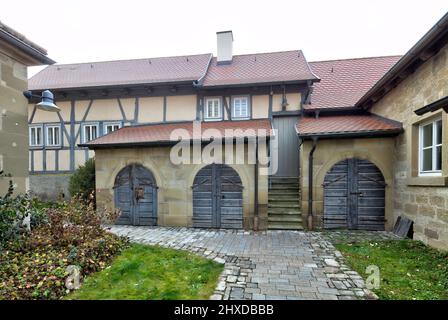 Kirchenburg, Gaden, Lagerhäuser, ehemalige Wehrkirche, Hausfassade, Winter, Nenzenheim, Franken, Deutschland, Europa, Stockfoto