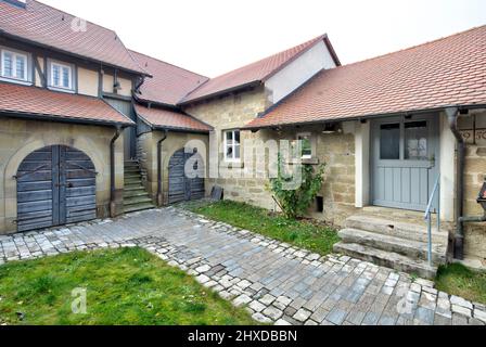 Kirchenburg, Gaden, Lagerhäuser, ehemalige Wehrkirche, Hausfassade, Winter, Nenzenheim, Franken, Deutschland, Europa, Stockfoto