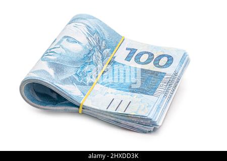 Viele 100-reais-Banknoten, brasilianisches Geld, tausend reais, Zahlung, Gehalt, Auf isoliertem weißem Hintergrund Stockfoto