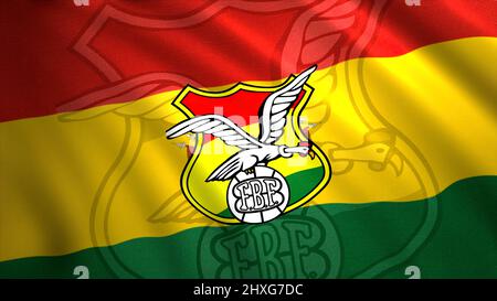 Flagge der Fußballmannschaft und des Landes. Bewegung. Winkende Flagge der Fußballmannschaft des südlichen Landes. Emblem der bolivianischen Fußballnationalmannschaft Stockfoto
