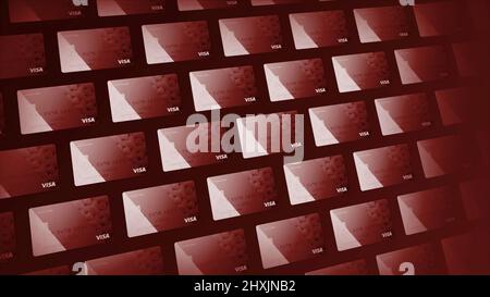 In vielen Zeilen schwebende Kreditkarten-Symbole. Bewegung. Rot schönes Design von modernen Kreditkarten, Konzept des Online-Shopping. Stockfoto