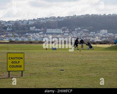 Vorsicht Golf Course Schild am Royal North Devon Golf Club, Westward Ho!, Devon, UK Stockfoto