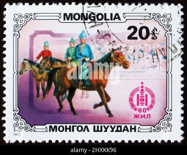 MONGOLEI - UM 1981: Eine in der Mongolei gedruckte Marke zeigt Reiter, um 1976 Stockfoto