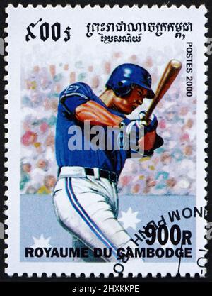 KAMBODSCHA - UM 2000: Eine in Kambodscha gedruckte Marke zeigt Baseballspieler, Sport, um 2000 Stockfoto
