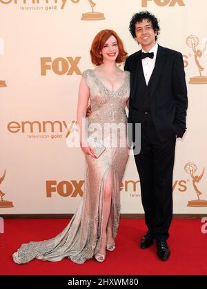 Christina Hendricks und Geoffrey Arend nehmen an den jährlichen Primetime Emmy Awards 63. im Nokia Theater L.A. in Los Angeles, Kalifornien, USA, Teil. Stockfoto