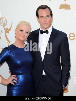 Amy Poehler; will Arnet nimmt an den jährlichen Primetime Emmy Awards 63. Teil, die im Nokia Theater L.A. in Los Angeles, Kalifornien, USA, verliehen werden. Stockfoto