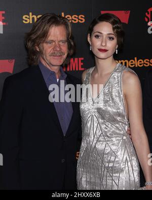 William H. Macy und Emmy Rossum während des Empfangs der „Shameless“ Saison 2 im Haus Los Angeles Stockfoto