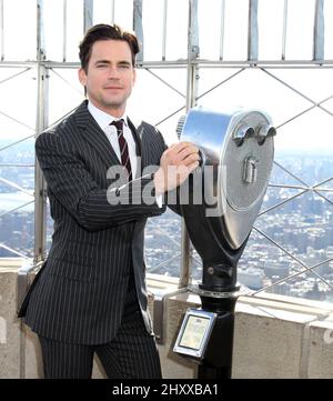 Matt Bomer aus der USA Network-Serie 'White Collar' besucht das Empire State Building in New York, USA. Stockfoto