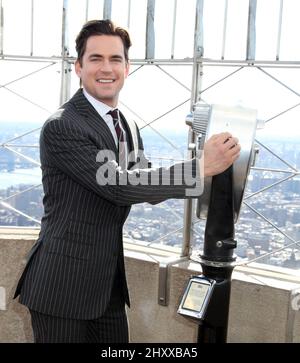 Matt Bomer aus der USA Network-Serie 'White Collar' besucht das Empire State Building in New York, USA. Stockfoto