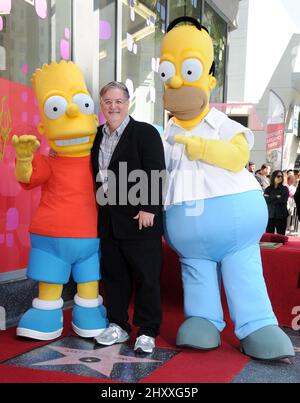 Matt Groening, Bart Simpson und Homer Simpson nehmen an Matt Groenings Starzeremonie in Hollywood in Los Angeles, USA, Teil. Stockfoto